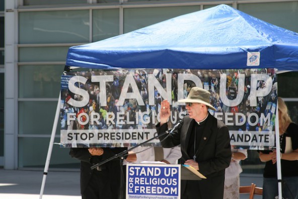 Bishop Thomas J. Olmsted is seen here at a July 8, 2012, rally in Phoenix. Organizers and participants in the nationwide "Stand Up for Religious Freedom" rallies object to the U.S. Health and Human Services mandate requiring nearly all private health insurance plans to include coverage for all FDA-approved prescription contraceptive drugs and devices, surgical sterilizations and abortion-inducing drugs.