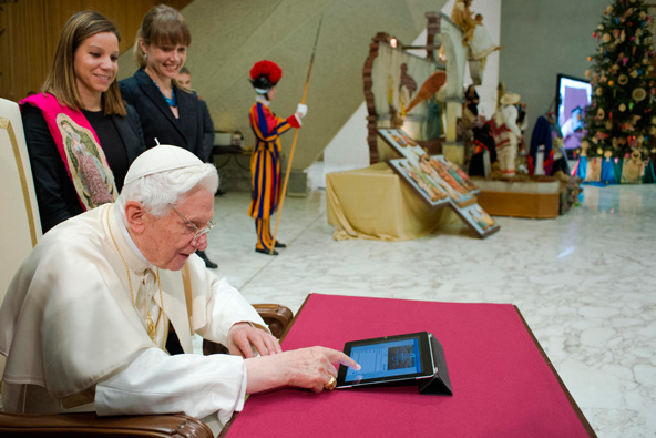 Pope Benedict XVI posts his first tweet on his Twitter account @Pontifex Dec. 12 in Paul VI hall at the Vatican. (CNS photo/L'Osservatore Romano via Reuters)