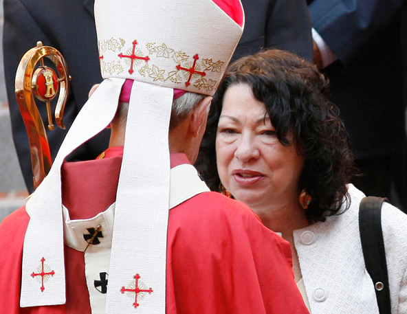 Supreme Court Justice Sonia Sotomayor talks with then-Archbishop Donald W. Wuerl of Washington following the 2009 annual Red Mass at the city's Cathedral of St. Matthew the Apostle. Sotomayor denied two companies' request for an injunction while they cha llenge part of the Department of Health and Human Services' contraceptive mandate in court. (CNS photo/Nancy Wiechec) 