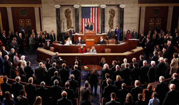 Speaker of the House John Boehner takes his oath during the first day of the 113th Congress at the U.S. Capitol in Washington Jan. 3. Boehner is one of 163 Catholics elected to Congress in November. The first Hindu and the first Buddhist also were electe d to the Senate. (CNS photo/Kevin Lamarque, Reuters)