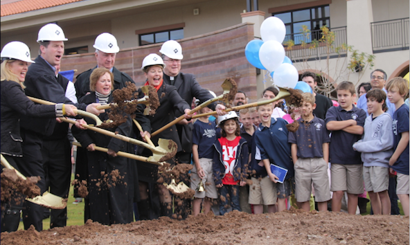 Key leaders of St. Francis Xavier's ongoing capital campaign ceremoniously breaks ground for the school's final building Jan. 27. (Ambria Hammel/CATHOLIC SUN)