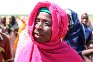 Touine Gero, above, described a typical day in the Sahel. For both men and women, it begins at 6 a.m. Men work the fields, while women grind grain, care for children, sweep, cook, fetch water and bring lunch to the men. (J.D. Long-Garcia/CATHOLIC SUN)