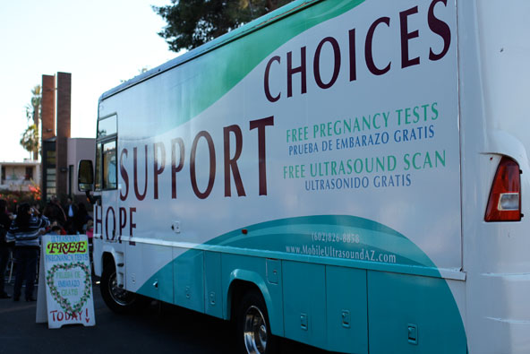 The Hope Mobile Unit parked at St. Jerome Parish during the Jan. 6 Family Festival. About 90 percent of women who see an ultrasound exam of their unborn child choose life. The ‘Hope’ van gives free exams to pregnant women. (J.D. Long-Garcia/CATHOLIC SUN)
