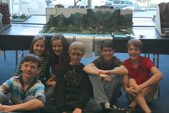 Our Lady of Perpetual Help students Joe Hart, Kate Straneva, Rachel Larsen, Reed Meyer, Andrew Nahom, and Ryan Straneva will have their Future City project on display for public voting at the Burton Barr Central Library through Jan. 25. (Ambria Hammel/CATHOLIC SUN)