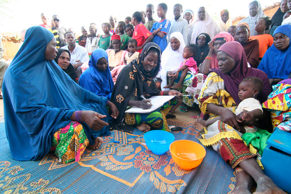 Women in Small Internal Lending Communities meet weekly. Together, they loan each other money for investments. (J.D. Long-Garcia/CATHOLIC SUN)