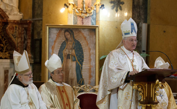 Cardinal Marc Ouellet, prefect of the Vatican's Congregation for Bishops, gives the homily during the closing Mass of the International Congress on the Church in America at the Church of Santa Maria in Traspontina in Rome Dec. 12. At left are Cardinal Se an P. O'Malley of Boston and Cardinal Oscar Rodriguez Maradiaga of Tegucigalpa, Honduras. (CNS photo/Paul Haring) 