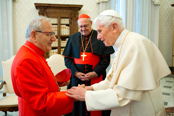 Pope Benedict XVI meets in a private audience with Archbishop Louis Sako of Kirkuk, the new patriarch of the Iraq-based Chaldean Catholic Church, Feb. 4 at the Vatican. (CNS photo/L'Osservatore Romano via Reuters)
