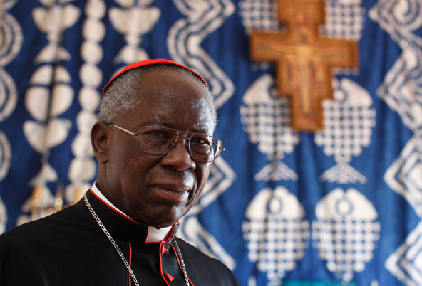 Nigerian Cardinal Francis Arinze, retired prefect of the Congregation for Divine Worship and the Sacraments, is pictured at his Vatican residence Feb. 12. Cardinal Arinze, who personally heard Pope Benedict XVI's resignation, said "I have no doubt about his wisdom....He doesn't rush, he is not rash, he is gentle but he is also clearheaded and firm. So it could not have been an idea he got the day before." (CNS photo/Paul Haring)
