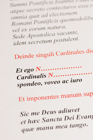 This is a detail view of the oath in Latin that each cardinal elector takes before the start of the conclave. Placing a hand on the Gospels, each elector swears to uphold the rules and secrecy of the conclave. This copy is from a collection of documents retained by U.S. Cardinal William H. Keeler from the 2005 conclave. (CNS photo by Nancy Phelan Wiechec)