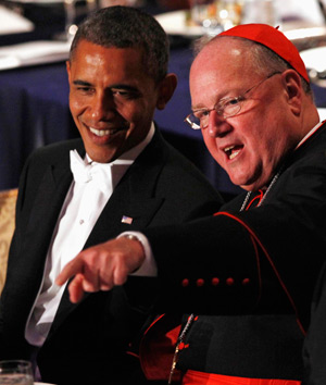 New York Cardinal Timothy M. Dolan has accepted a White House offer to continue discussing Catholic Church concerns over federal rules governing implementation of the Affordable Care Act, abortion and traditional marriage in a letter to President Barack Obama. The president and Cardinal Dolan are pictured at the 2012 Alfred E. Smith Memorial Foundation Dinner in New York. (CNS photo/Jim Young, Reuters)