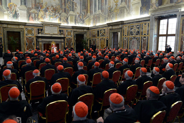 Pope Benedict XVI addresses the College of Cardinals at the Vatican Feb. 28, the final day of his papacy. In attendance were 144 cardinals, including many of the 115 younger than 80 who are eligible and expected to vote in the upcoming conclave. (CNS pho to/L'Osservatore Romano via Reuters) 