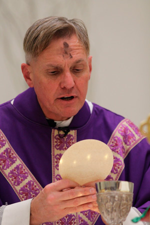 Fr. Rob Clements celebrated the first Mass at the new church at All Saints Catholic Newman Center on Ash Wednesday. (J.D. Long-Garcia/CATHOLIC SUN)