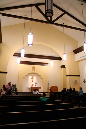Parishioners adore the Lord in the Eucharist at the new chapel at St. Henry Parish. (Ambria Hammel/CATHOLIC SUN)