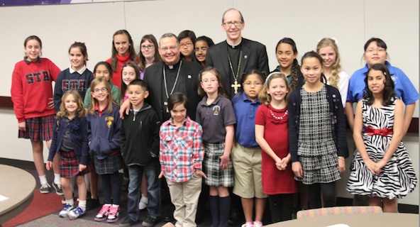 Winners of the 2012 Arizona Rosary Celebration poster contest with Phoenix's bishops (Ambria Hammel/CATHOLIC SUN)