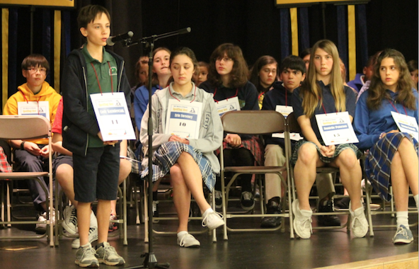 The diocesan spelling bee came down to Cody Kazmierczak from Our Lady of Perpetual Help in Scottsdale and eighth-grader Erin Sweeney from Blessed Pope John XXIII in Scottsdale. Hailey Barrell from Ss. Simon and Jude and Lianna Nemeth from St. Gregory finished third and fourth. (Ambria Hammel/CATHOLIC SUN)