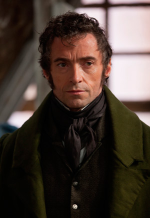 Hugh Jackman stars in a scene from the movie "Les Miserables." John Mulderig of Catholic News Service's Media Review Office ranked the film as one of the top 10 family films for 2012. (CNS photo/Universal)  "Les Miserables" (2012) Lavish adaptation of the worldwide musical stage sensation, based on the Victor Hugo novel and directed by Tom Hooper. Inspired by the kindness of a Catholic bishop (Colm Wilkinson), an ex-convict (Hugh Jackman) assumes a new identity and amends his life, becoming a benevolent mayor and factory owner, all the while evading the obsessive pursuit of his former jailer (Russell Crowe). When one of his workers (Anne Hathaway) is unjustly fired and forced into a life of prostitution, he pledges to raise her daughter (Isabelle Allen) as his own. Years pass, and the now-grown lass (Amanda Seyfried) falls for a young revolutionary (Eddie Redmayne) amid violent protests on the barricaded streets of Paris. A positive portrayal of the Catholic faith, with characters calling on God for grace and mercy, and seeking personal redemption while trying to better the lives of others, makes this rousing film especially appealing to mature viewers of faith. Scenes of bloody violence, a prostitution theme, nongraphic nonmarital sexual activity. Spanish titles option. The Catholic News Service classification is A-III -- adults. The Motion Picture Association of America rating is PG-13 -- parents strongly cautioned. Some material may be inappropriate for children under 13. (Universal Studios Home Entertainment; also available on Blu-ray)