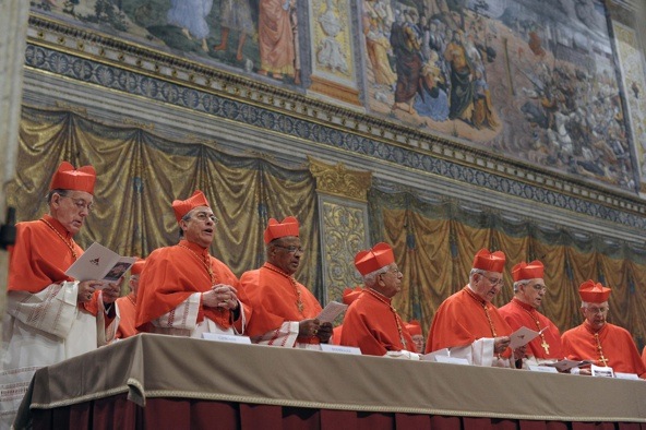 Cardinals from around the world are seen in the Vatican's Sistine Chapel March 12 as they begin the conclave to elect a successor to Pope Benedict XVI. Shut off from the outside world, the 115 cardinals will cast ballots to elect a new pontiff. (CNS photo/L'Osservatore Romano via Reuters)
