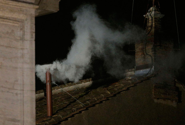 White smoke rises from the chimney above the Sistine Chapel in the Vatican, indicating a new pope has been elected, March 13. The conclave to elect a new pope met over two days before making a decision. (CNS photo/Max Rossi, Reuters)