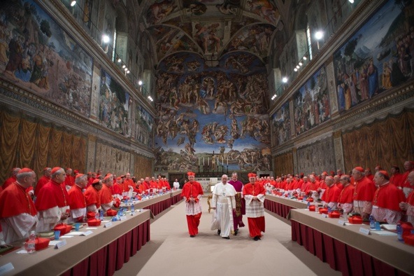 Pope Francis leaves the Sistine Chapel after being elected pope and shortly before appearing for the first time on the central balcony of St. Peter's Basilica at the Vatican March 13. The 76-year-old Jesuit became the first Latin American pope and will be installed March 19 as the leader of the world's more than 1 billion Catholics. (CNS photo/L'Osservatore Romano)