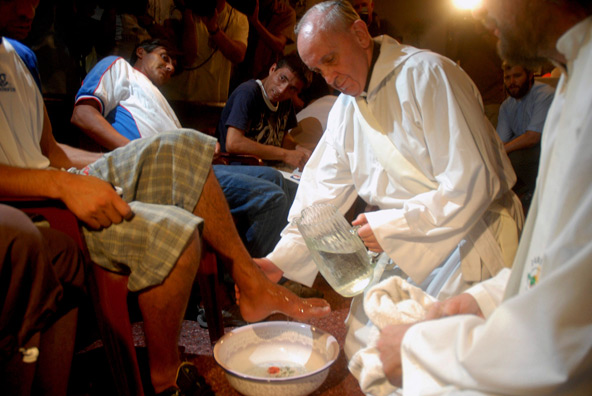 Argentine Cardinal Jorge Mario Bergoglio washes the feet of residents of a shelter for drug users during Holy Thursday Mass in 2008 at a church in a poor neighborhood of Buenos Aires, Argentina. (Enrique Garcia Medina, Reuters/CNS)