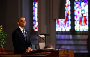 U.S. President Barack Obama pauses as he speaks during the "Healing Our City" interfaith memorial service April 18 at the Cathedral of the Holy Cross for the victims of the Boston Marathon bombing. The April 15 bombing claimed the lives of at least three people and injured more than 170. (CNS photo/Kevin Lamarque, Reuters ) 