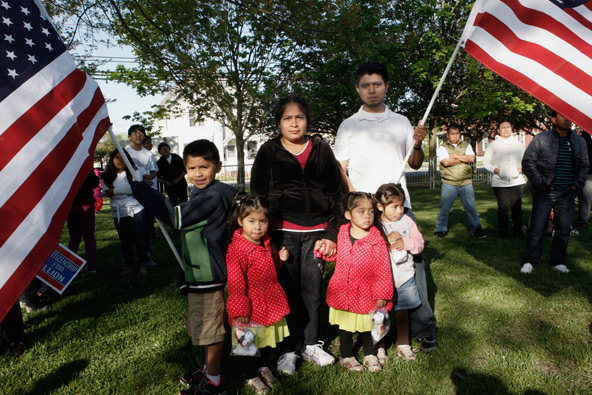 The Miranda family, from Milton, Del., participate in an immigration reform rally in Georgetown, Del., May 1. More than 1,000 people gathered for the rally in the town, where about 48 percent of the population is of Latino or of Hispanic origin, accordin g to the U.S. Census Bureau. Poultry processing, agriculture and the tourist industry of nearby beach resorts are where many of the immigrants work. (CNS photo/Patricia Zapor)