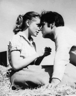 Dolores Hart and Elvis Presley star in the 1957 movie "Loving You." The young starlet left a promising acting career at age 25 to join the Benedictine Abbey of Regina Laudis in Bethlehem, Conn., where today she serves as prioress. Her autobiography, "Th e Ear of the Heart: An Actress' Journey From Hollywood to Holy Vows," co-written with Richard DeNeut, was released in May. (CNS photo/courtesy of Ignatius Press)