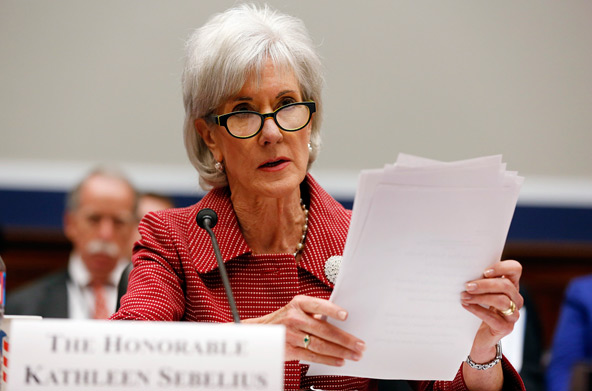 U.S. Department of Health & Human Services Secretary Kathleen Sebelius gathers her prepared remarks as she testifies before a hearing of the House Education and the Workforce Committee on Capitol Hill in Washington June 4. HHS' final rules on the federal contraceptive does not appear, on first analysis, to eliminate "the need to continue defending our rights in Congress and the courts," the president of the U.S. bishops' conference, New York Cardinal Timothy M. Dolan, said July 3. (CNS photo/Jim Bourg, Reuters)