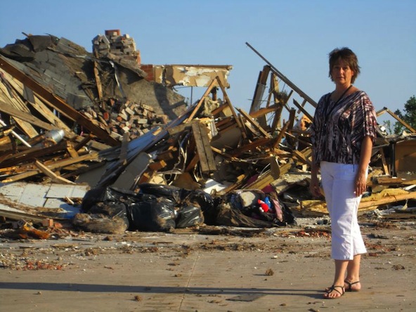 Julie Carrick tours the tornado damage in Moore, Okla. July 21. The only evidence remaining for some homes is a driveway and part of a mailbox. (courtesy photo)