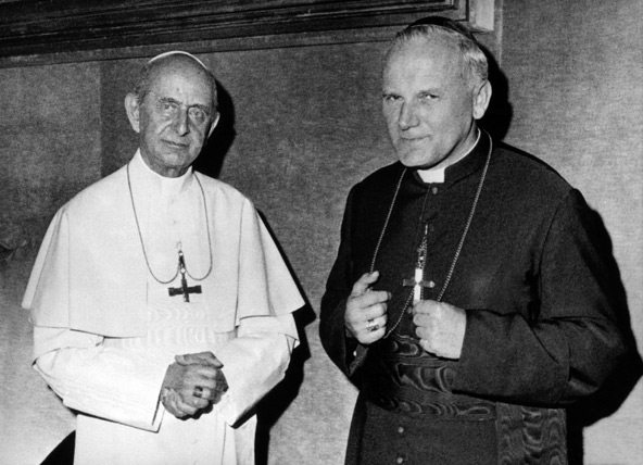 Pope Paul VI and Cardinal Karol Wojtyla meet at the Vatican in this undated photo. Paul VI, who served in Poland during his early priesthood, held the future Pope John Paul II in high regard. (CNS file photo) 