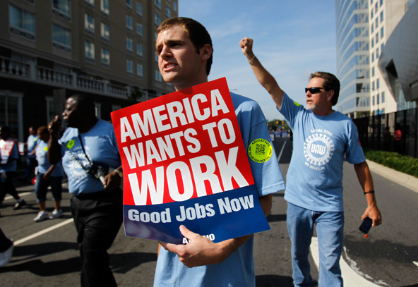 Chris Martin, center, marches with Local 5285 in a Labor Day parade ahead of the 2012 Democratic National Convention in Charlotte, N.C., Sept. 3. (CNS photo/Jessica Rinaldi, Reuters) 