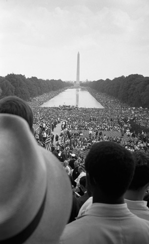 Crowds surround the Reflecting Pool during the 1963 March on Washington. As the 50th anniversaries of key civil rights events approach, some observe that there's still a long way to go toward eliminating racism in U.S. society. (CNS photo/Warren K. Leffler, Library of Congress) 