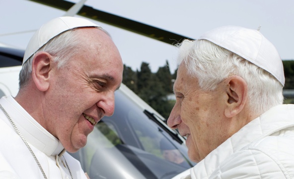 Pope Francis greets retired Pope Benedict XVI in late March at the papal summer residence in Castel Gandolfo, Italy. Both popes have called on Catholics to swim against the tide. (CNS photo/L'Osservatore Romano via Reuters)