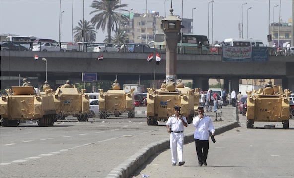 Egyptian army soldiers and armored personnel carriers are positioned near Tahrir Square in Cairo August 19. In an Aug. 18 statement, Coptic Catholic Patriarch Ibrahim Isaac Sedrak urged the country's Catholics to strongly support 