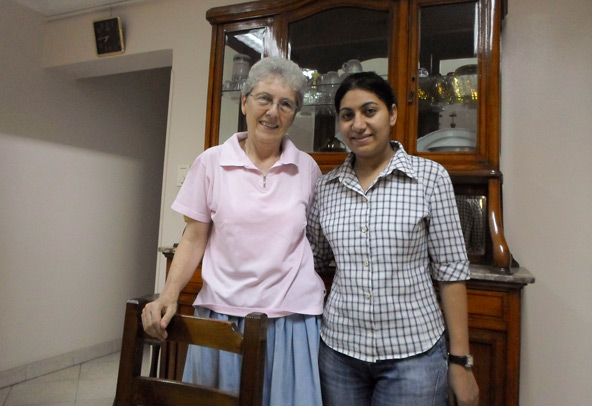 Canadian Sister Darlene DeMong, a member of the Congregation of Notre Dame de Sion, stands with a novice at the order's residence in Cairo Aug. 22. The nun told Catholic News Service that while in the south in Berba days before, Muslim neighbors helped t o guard a convent, church and other Christian facilities, while elsewhere in the country attacks against Christian properties were being carried out. (CNS photo/James Martone) (Aug. 22, 2013)