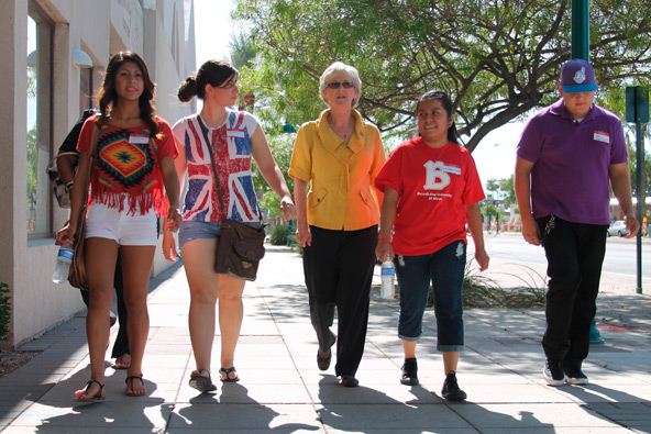 Jo Wilson, center, senior administrator at Benedictine University at Mesa’s new campus, leads incoming students on a tour July 18. Grand opening is Aug. 27. (Ambria Hammel/CATHOLIC SUN)