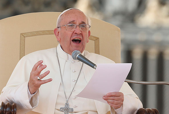 Pope Francis speaks during his general audience in St. Peter's Square at the Vatican Sept. 25. (CNS photo/Paul Haring)