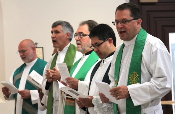 Fr. David Sanfilippo, vicar for priests, sings during a special Mass to formally welcome newly arrived priests and religious Sept. 11. (Ambria Hammel/CATHOLIC SUN)