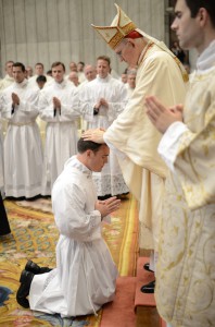 Cardinal Harvey ___ lays hands on Kevin Grimditch, a seminarian for the Diocese of Phoenix, during his Oct. 3 ordination to the diaconate. It marks his final formal step before priestly ordination, God-willing, next June. (PNAC Photo Services)