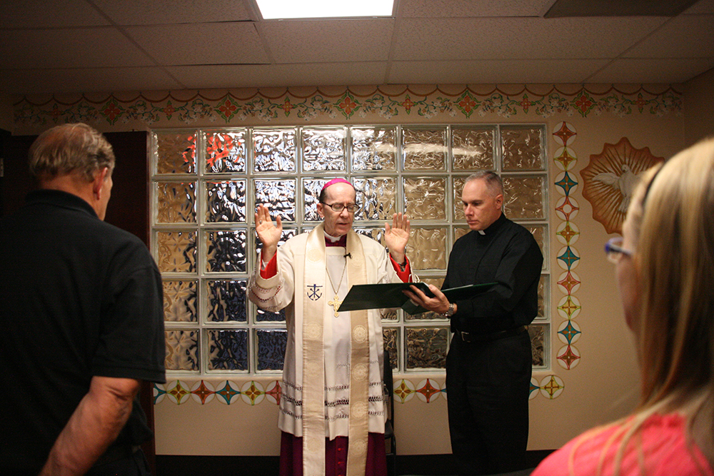 Bishop Thomas J. Olmsted blessed 1st Way's new facility 4,800 square-foot building in a ceremony Oct. 18. (Kevin Theriault/CATHOLIC SUN) 