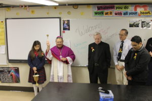 Bishop Eduardo A. Nevares blessed a junior high science room at St. Vincent de Paul School Nov. 23. The Maryvale campus offers two classrooms per grade level for the first time since 1990. (Ambria Hammel/CATHOLIC SUN)