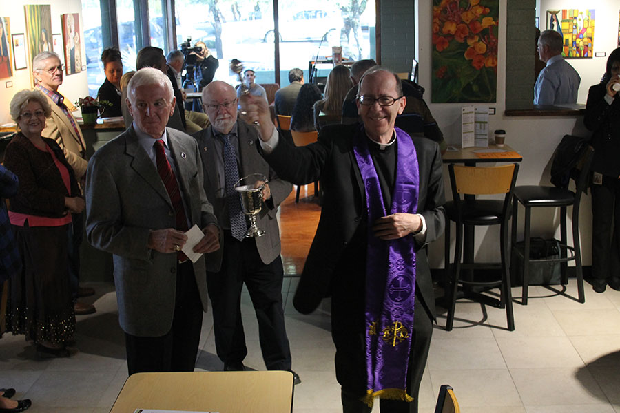 Bishop Thomas J. Olmsted blessed the Refuge Coffee House. (Ambria Hammel/CATHOLIC SUN)