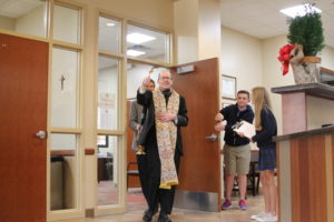 Bishop Olmsted blesses administrative offices inside the Faith and Education Center at St. Francis Xavier (Ambria Hammel/CATHOLIC SUN)