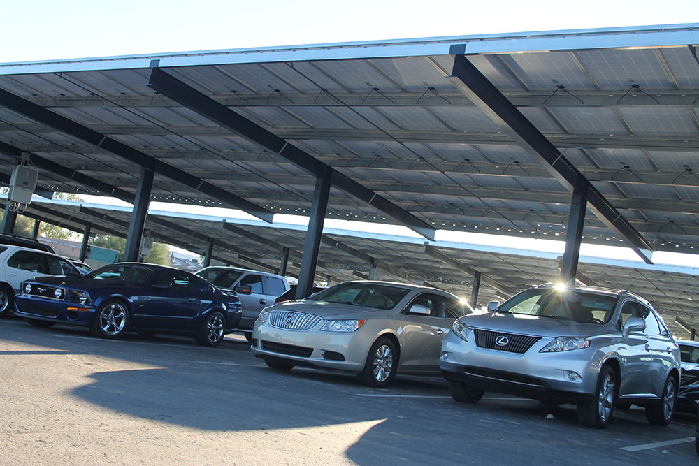 Covered parking at Blessed Sacrament in Scottsdale (pictured) and Sacred Heart in Prescott doubles as solar panels used to power the parishes. (Ambria Hammel/CATHOLIC SUN)