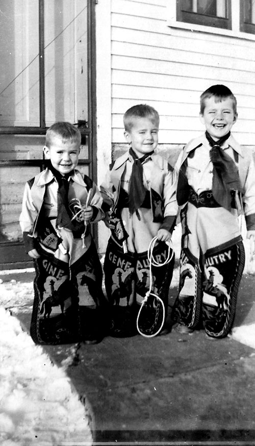 Tiny cowboys: Young Tom Olmsted (left) with his brothers, in their Gene Autry chaps. (Courtesy Olmsted family)
