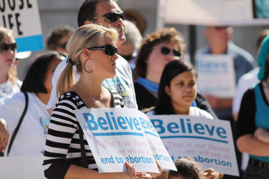 Hundreds turn out to mark the anniversary of "Roe v. Wade" at this 2013 rally in Phoenix. (File photo by J.D. Long-García/CATHOLIC SUN)