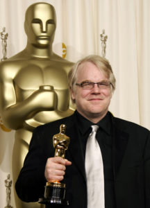 Phillip Seymour Hoffman poses with the Oscar for best actor for his role in "Capote" at the 78th annual Academy Awards in Hollywood, in this March 5, 2006, file photo. Hoffman, considered one of the leading actors of his generation, was found dead in his Manhattan apartment Feb. 2, in what police sources described as an apparent drug overdose. His funeral Mass was celebrated Feb. 7 at St. Ignatius Loyola Church in New York. (CNS photo/Mike Blake, Reuters)