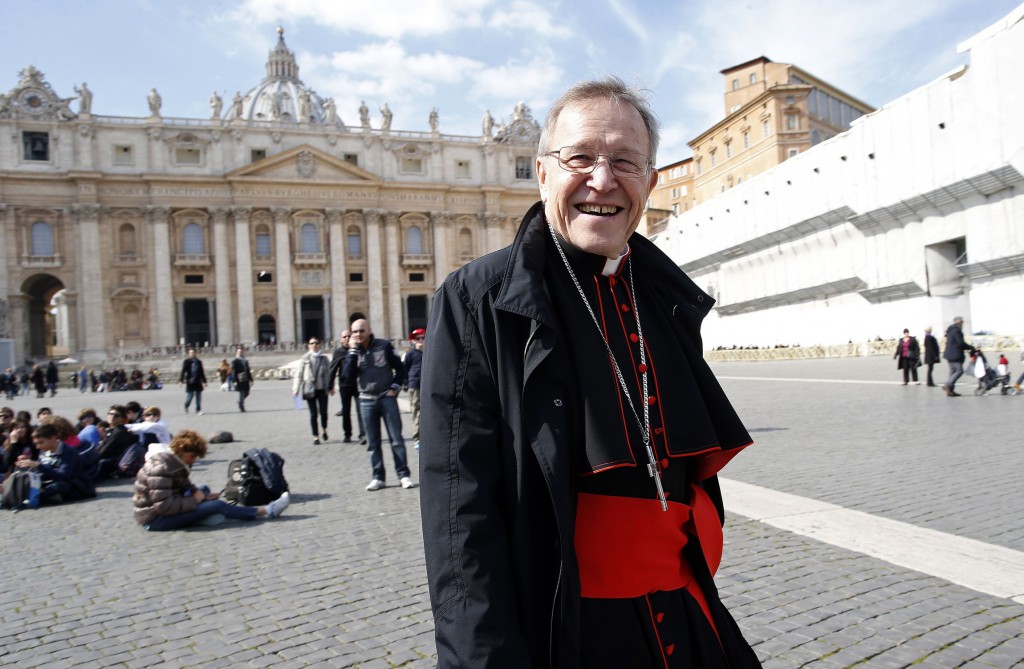 German Cardinal Walter Kasper walks smiles in St. Peters Square March 4, after the first day the College of Cardinals met to begin the process of electing a new pope. (CNS photo/Tony Gentile, Reuters)