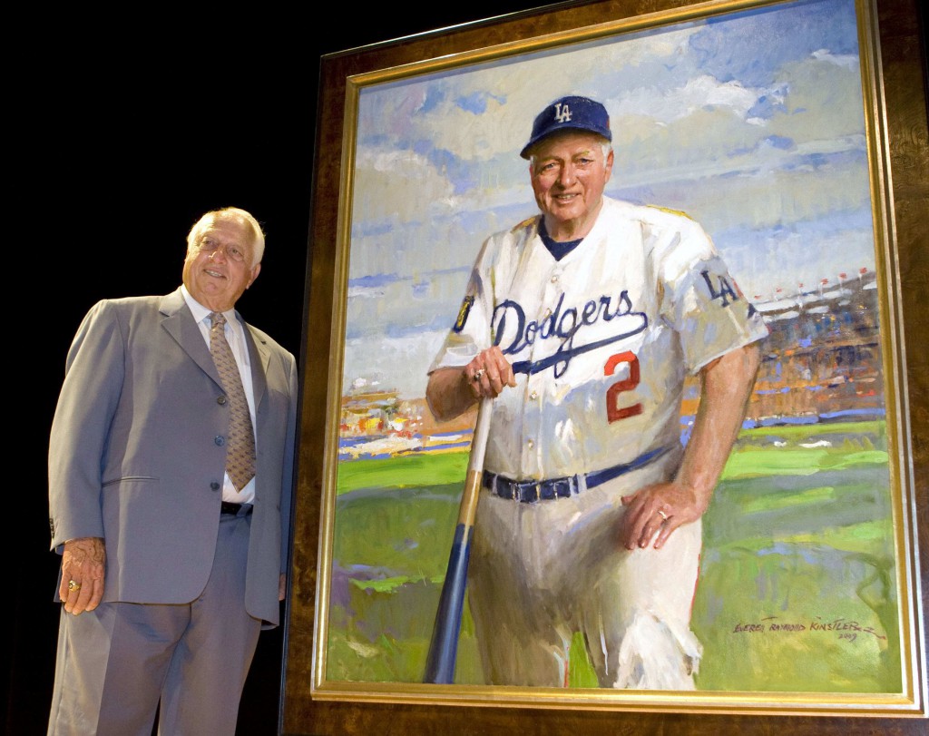 Former Los Angeles Dodgers manager Tommy Lasorda stands next to his portrait before it is hung at the National Portrait Gallery in Washington in this 2009 file photo. Lasorda, a Catholic, led the Dodgers to eight division titles and two world championships in 21 seasons as manager. (CNS photo/Larry Downing, Reuters)