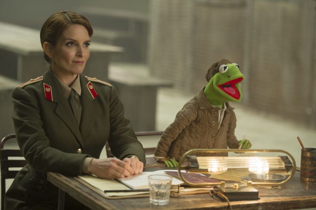 Tina Fey and Kermit the Frog star in a scene from the movie "Muppets Most Wanted." (CNS photo/Disney)